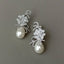 Teardrop White Sea Shell Pearl Cubic Zirconia micro pave Pave Flower Stud Earrings  for women/girls,high quality