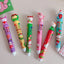 Sanrio Christmas Cute Ten-color Ballpoint Pens with Kuromi Kitty Melody Cap Students' 10-color Handbook Pens Christmas Gifts